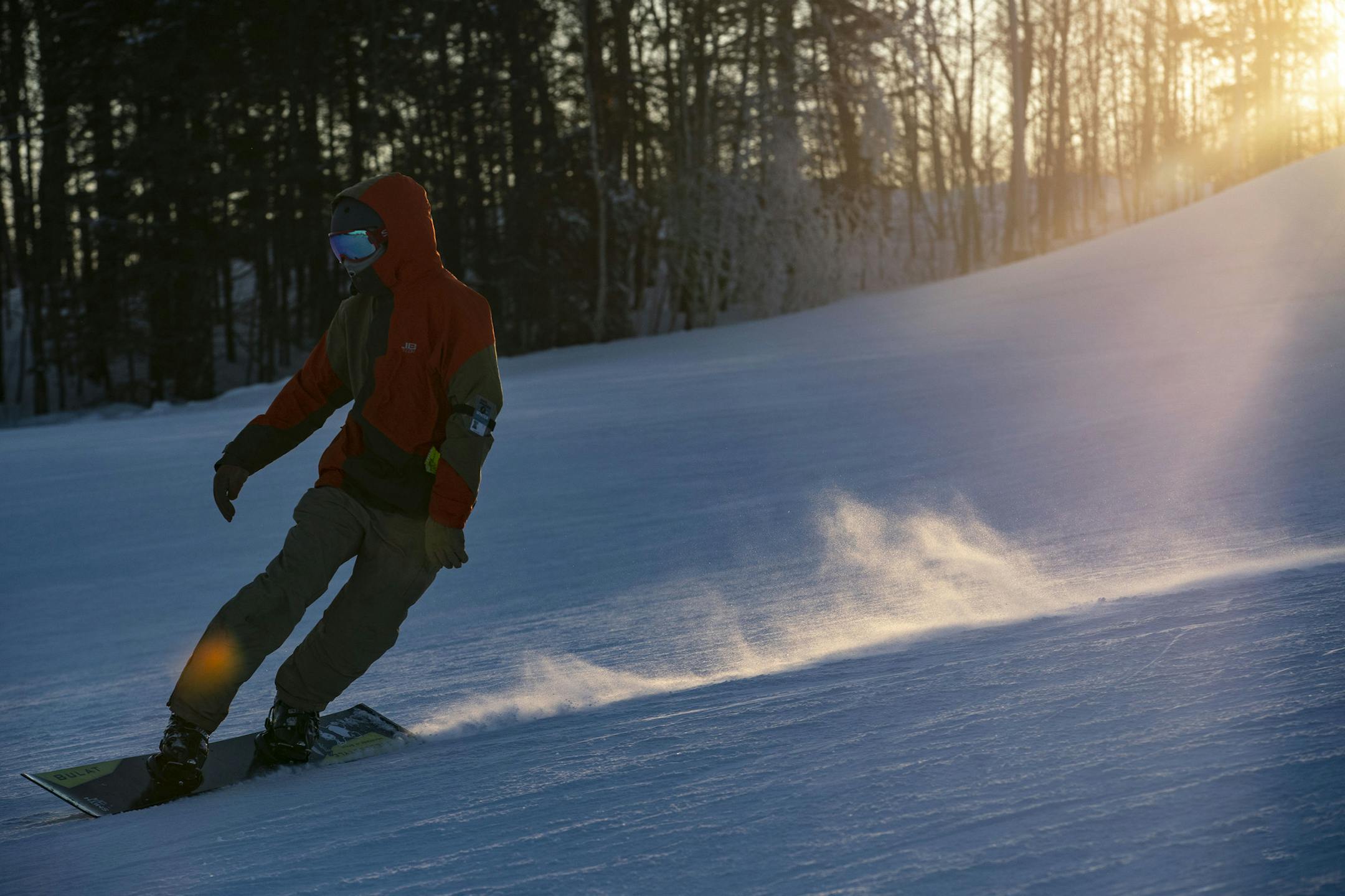 A snowboarder made their way down a Spirit Mountain run during sunset on Dec. 17, 2019. The city is looking for task force members to help fix the public ski hill's finances. ALEX KORMANN • alex.kormann@startribune.com