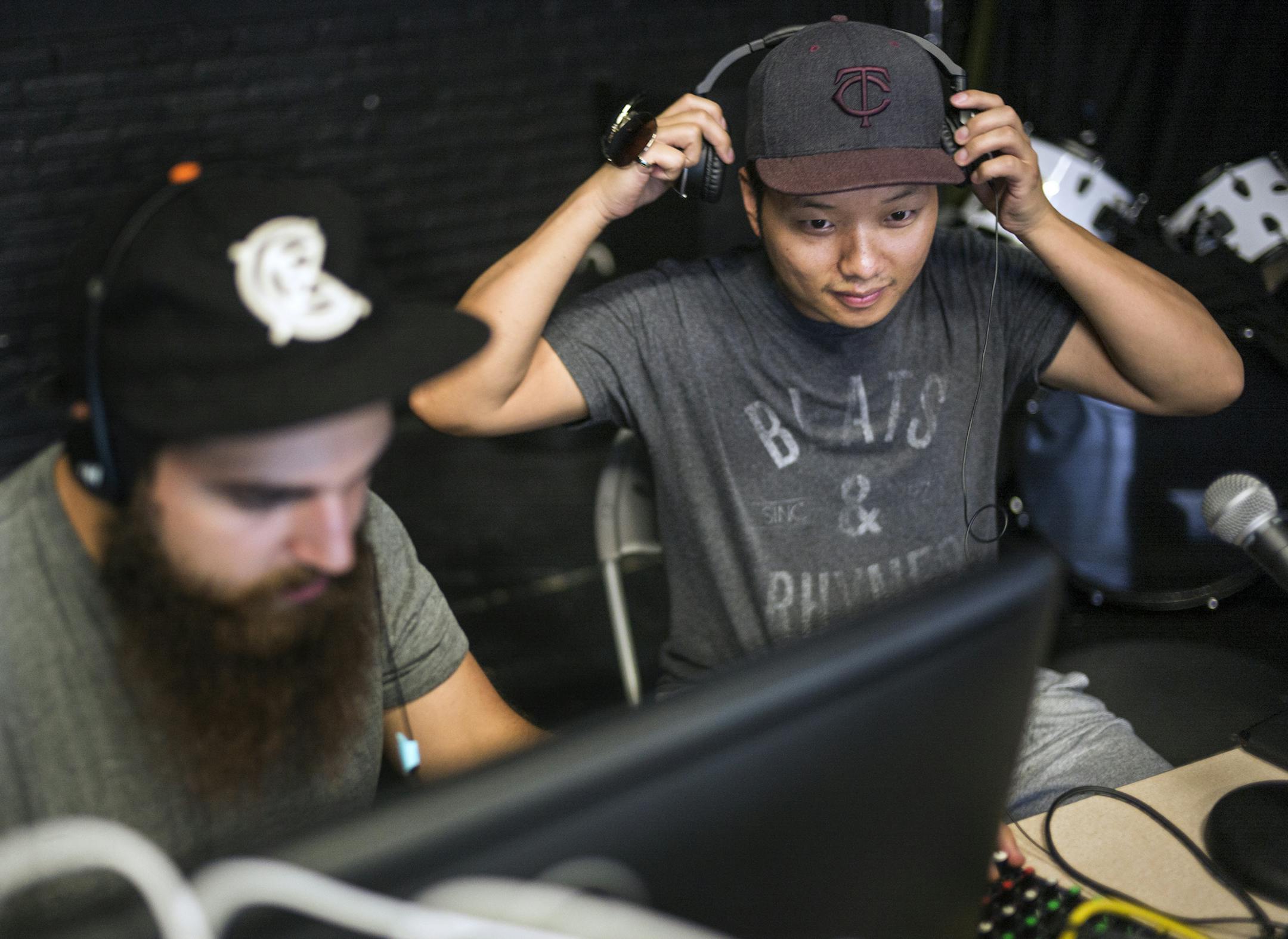 Engineer Jon Riddle helps Vong Lee record his "Power Hour" music show at the Chat Studio. Lee focuses on underplayed hip-hop tracks in his show. A handful of low-power community radio stations are popping up around the Twin Cities, a product of a change to federal communications law in 2011 that opened up more frequencies to groups that hadn't been able to get them.]Richard Tsong-Taatarii/rtsong-taatarii@startribune.com