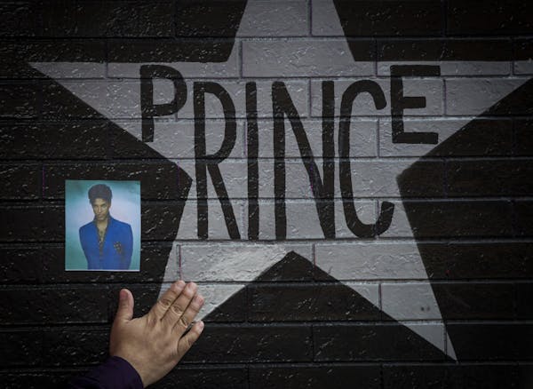 A hand reached out to touch Prince&#x2019;s star at First Avenue on April 21, 2016, the day he was found dead.