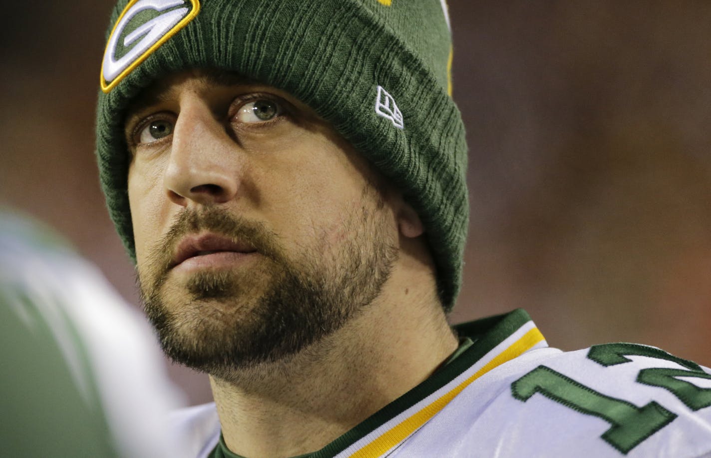 Green Bay Packers quarterback Aaron Rodgers (12) looks up at the scoreboard during the first half of an NFL wild card playoff football game against the Washington Redskins in Landover, Md., Sunday, Jan. 10, 2016. (AP Photo/Mark Tenally)