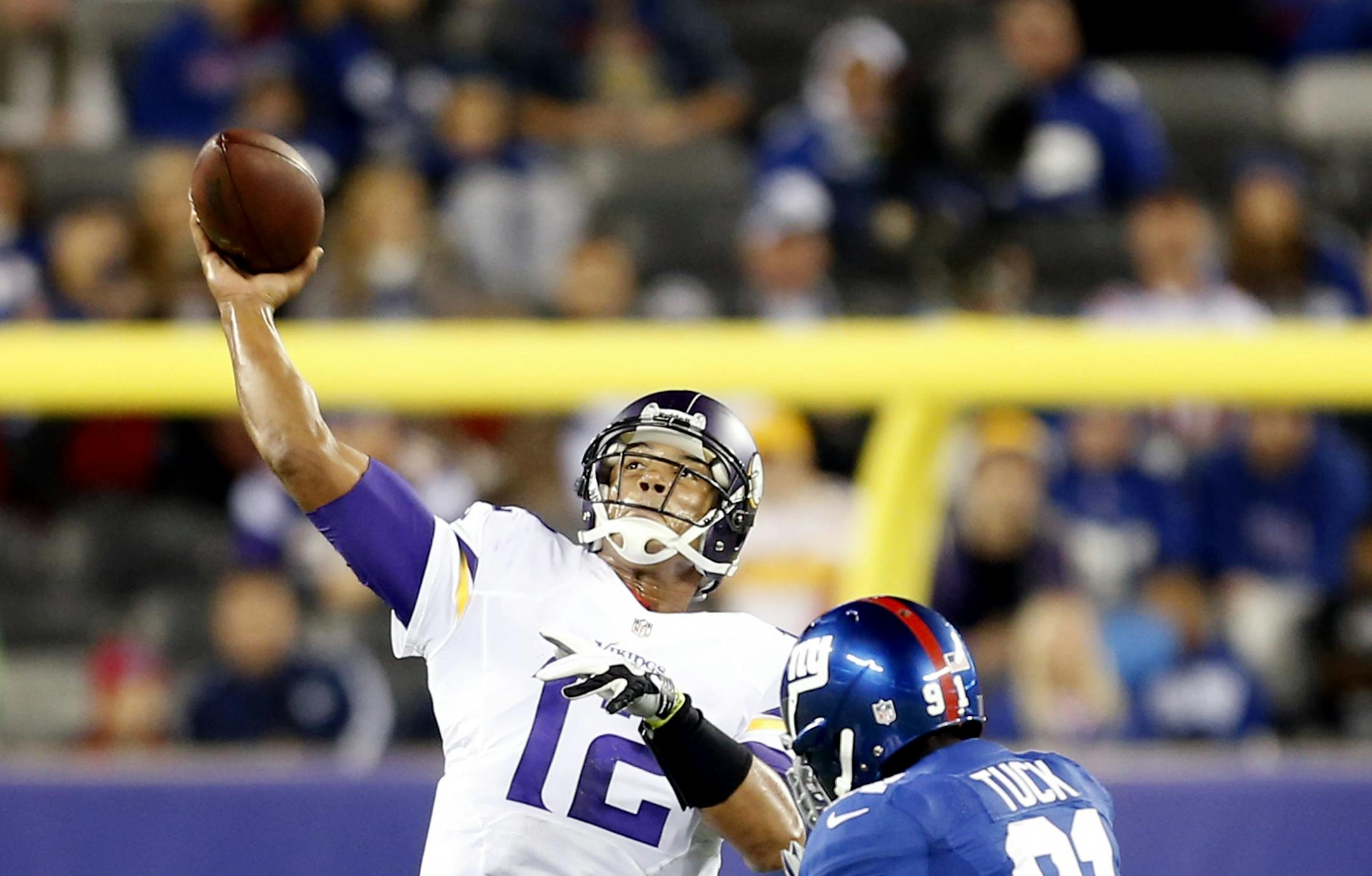 Vikings quarterback Josh Freeman (12)