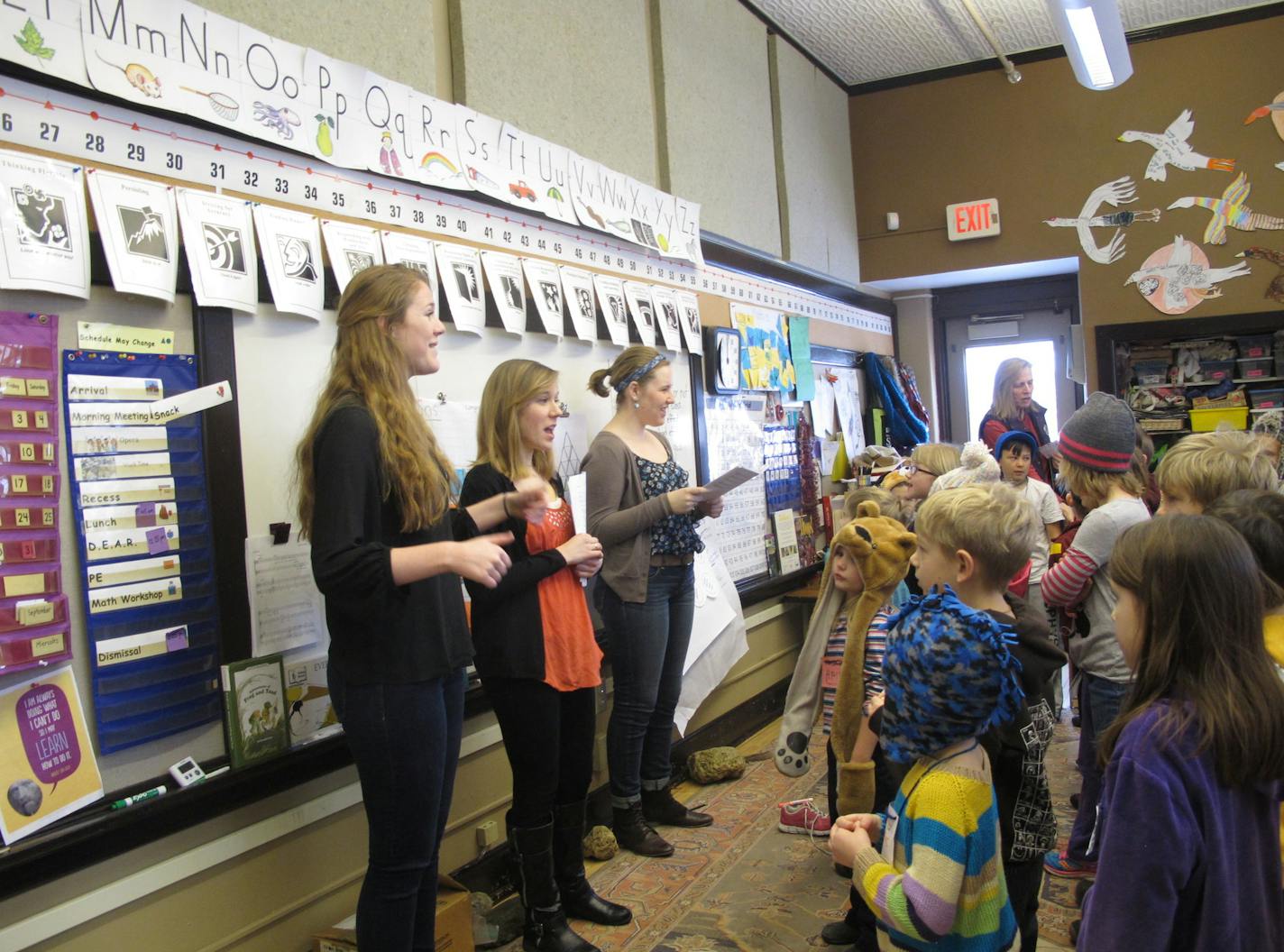 By Erin Adler. Sarah Bauer, Katie Miller and Myrtle Lemon, all students at St. Olaf College in Northfield, rehearse scenes from the opera that they are working on with students from Prairie Creek Community School in Northfield.