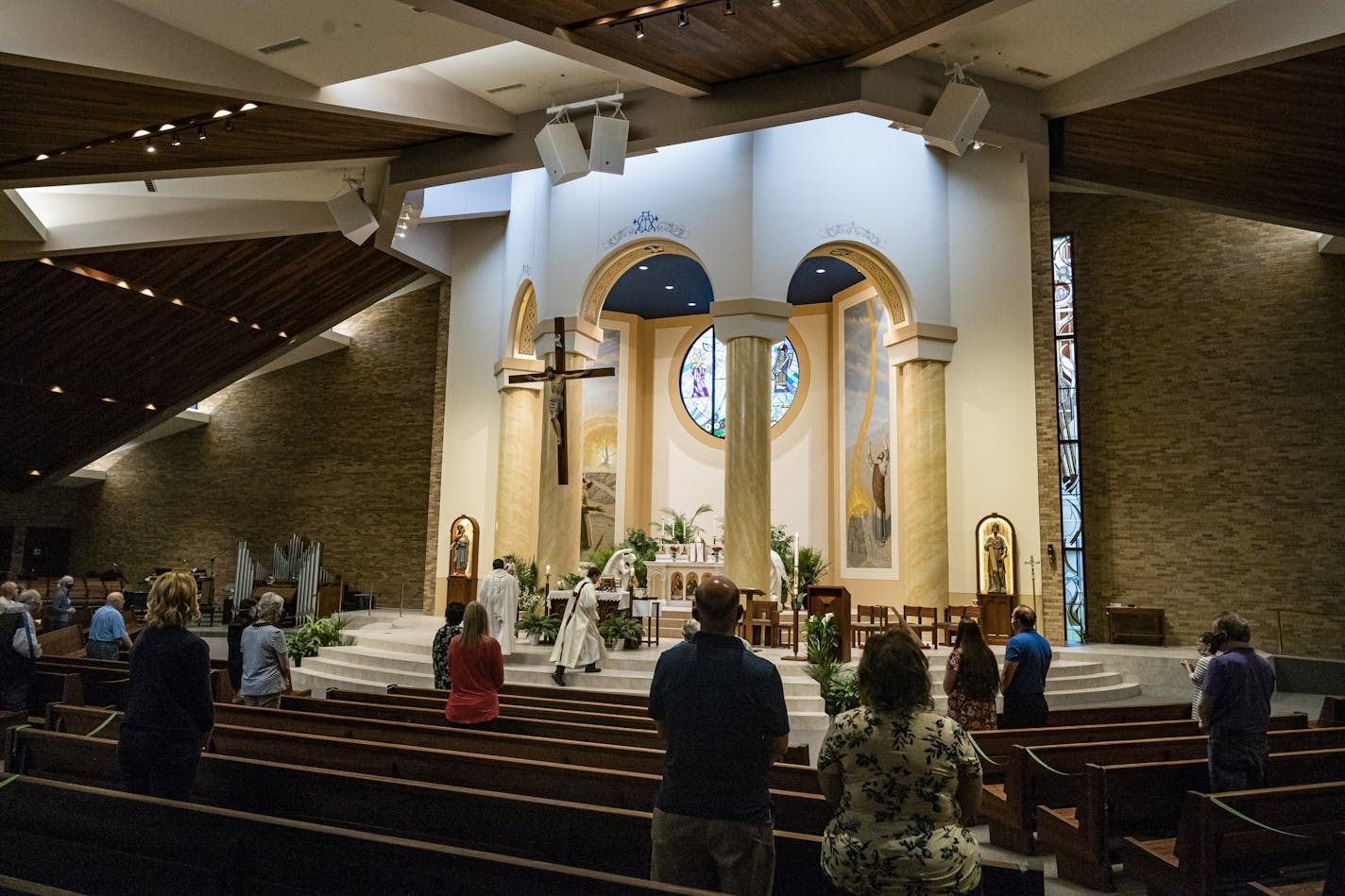 Parishioners were able to attend a service presided by Father John Paul Erickson as pews were closed off to allow social distancing and a maximum capacity of 250 or less than 25%.