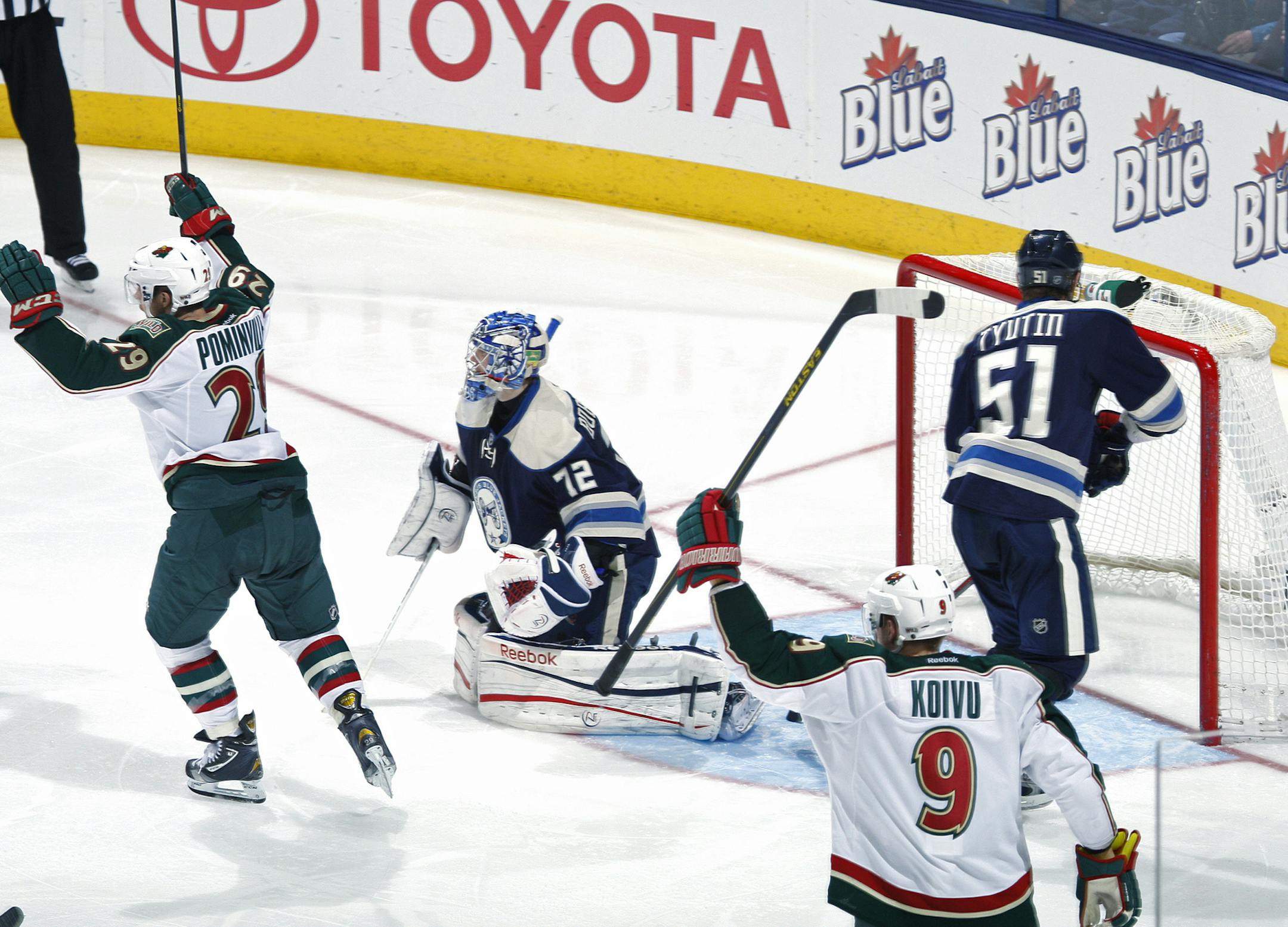 A whirlwind week took a turn for the better Sunday in Columbus when Jason Pominville, left, celebrated after assisting on Ryan Suter’s goal. Pominville also scored his first goal with the Wild in a 3-0 victory.