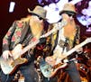 Dusty Hill, left, and Billy Gibbons of the U.S. rock band ZZ Top perform during their Summer/Fall Tour concert in Pardubice, Czech Republic, on Monday