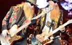 Dusty Hill, left, and Billy Gibbons of the U.S. rock band ZZ Top perform during their Summer/Fall Tour concert in Pardubice, Czech Republic, on Monday