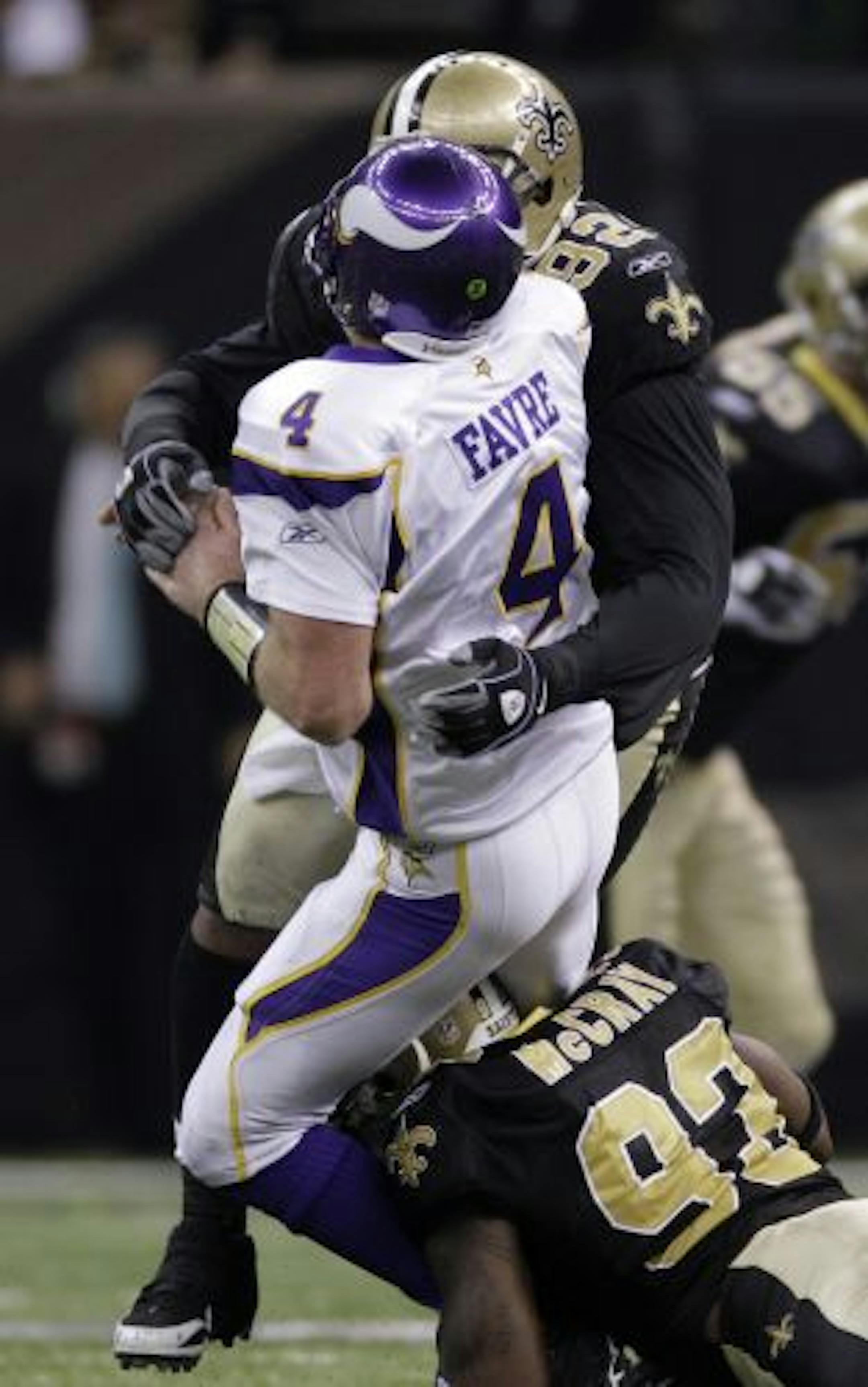 Saints tackle Remi Ayodele hit Brett Favre high and teammate Bobby McCray hit him low in the third quarter of Sunday's NFL Championship Game. Mike Pereira, the NFL's vice president of officiating, admitted on the NFL Network's "Total Access" show this week that referee Pete Morelli's crew should have called a 15-yard penalty on the play.