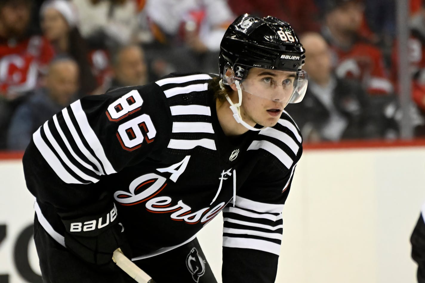 New Jersey Devils center Jack Hughes (86) during the first period of an NHL hockey game against the Vancouver Canucks Monday, Feb. 6, 2023, in Newark, N.J. (AP Photo/Bill Kostroun).