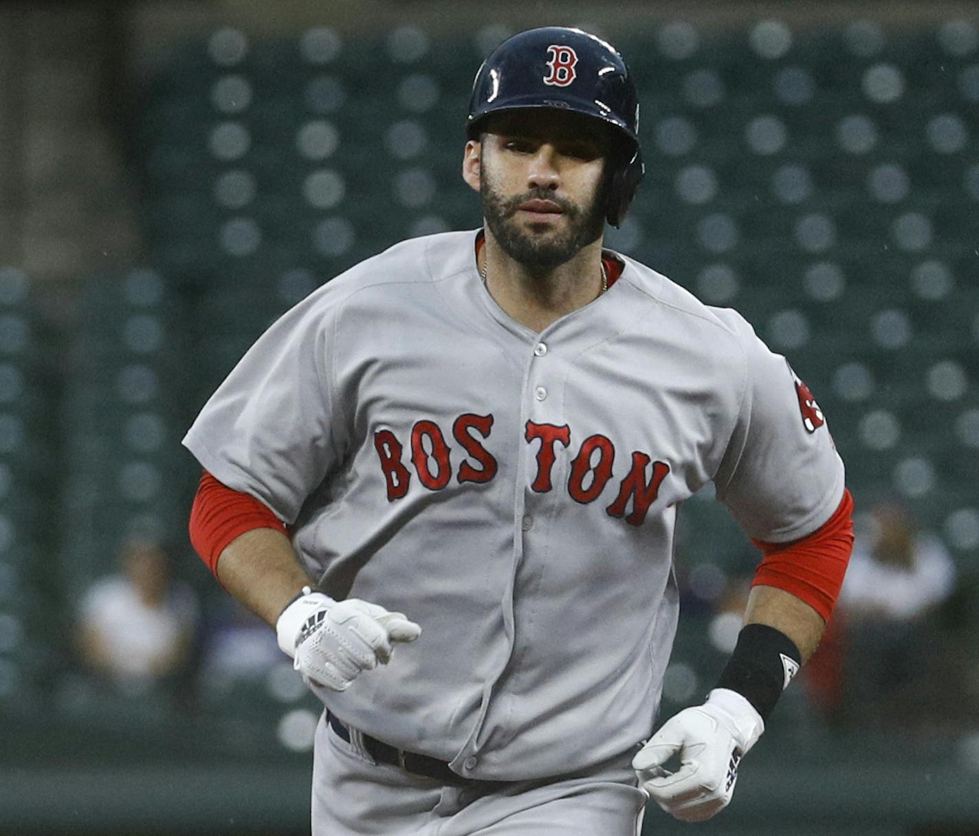 Boston Red Sox's J.D. Martinez rounds the bases with a solo home run during the first inning of a baseball game against the Baltimore Orioles, Wednesday, July 25, 2018, in Baltimore. (AP Photo/Patrick Semansky)