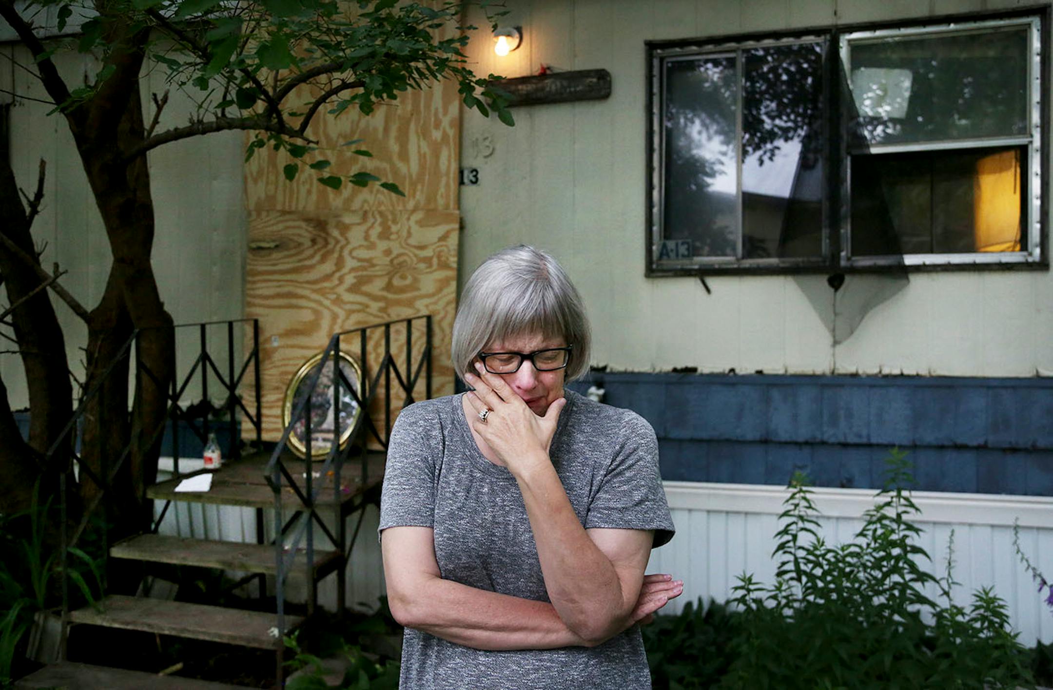 Nancy Gonzalez, friend of Lowry Grove mobile home park resident Frank Adelmann 59, who took his own life days earlier, breaks down in tears outside Adelmann's home while talking about her friend Thursday, June 29, 2017, in St. Anthony, MN. "Frank's death is harder on me that my own parents and my own sister because it was preventable." Residents who knew Adelmann say he told them he wasn't leaving Lowry Grove, both due to the condition of his home (it could not be moved) and a lack of options of