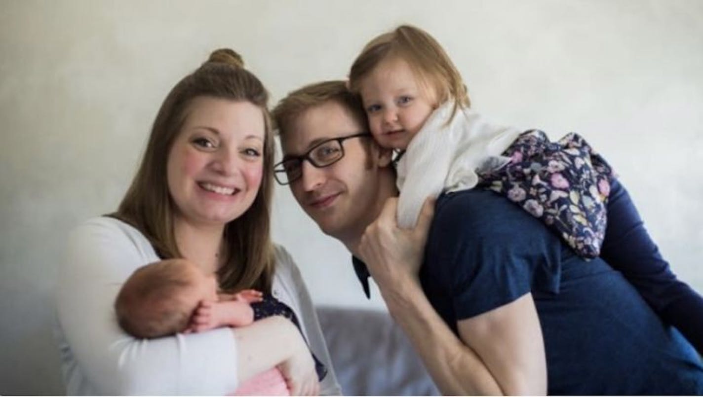 Jacob Babcock, shown with his family, was recovering from surgery after a shooting Tuesday near the Sherwin-Williams paint store he manages on W. Lake Street in Minneapolis.