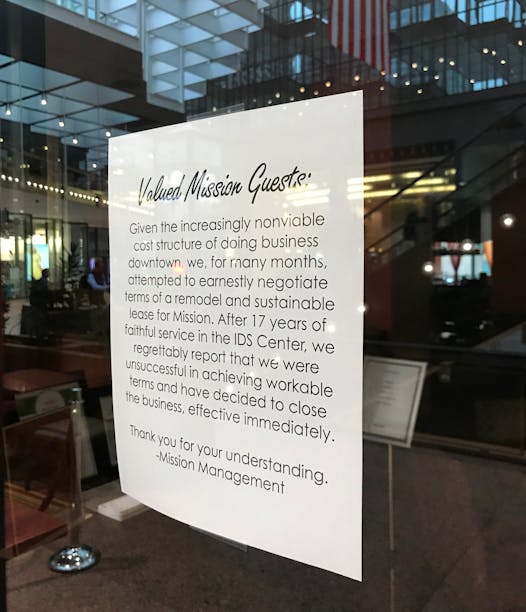 A sign posted outside of Mission American Kitchen in IDS Center.