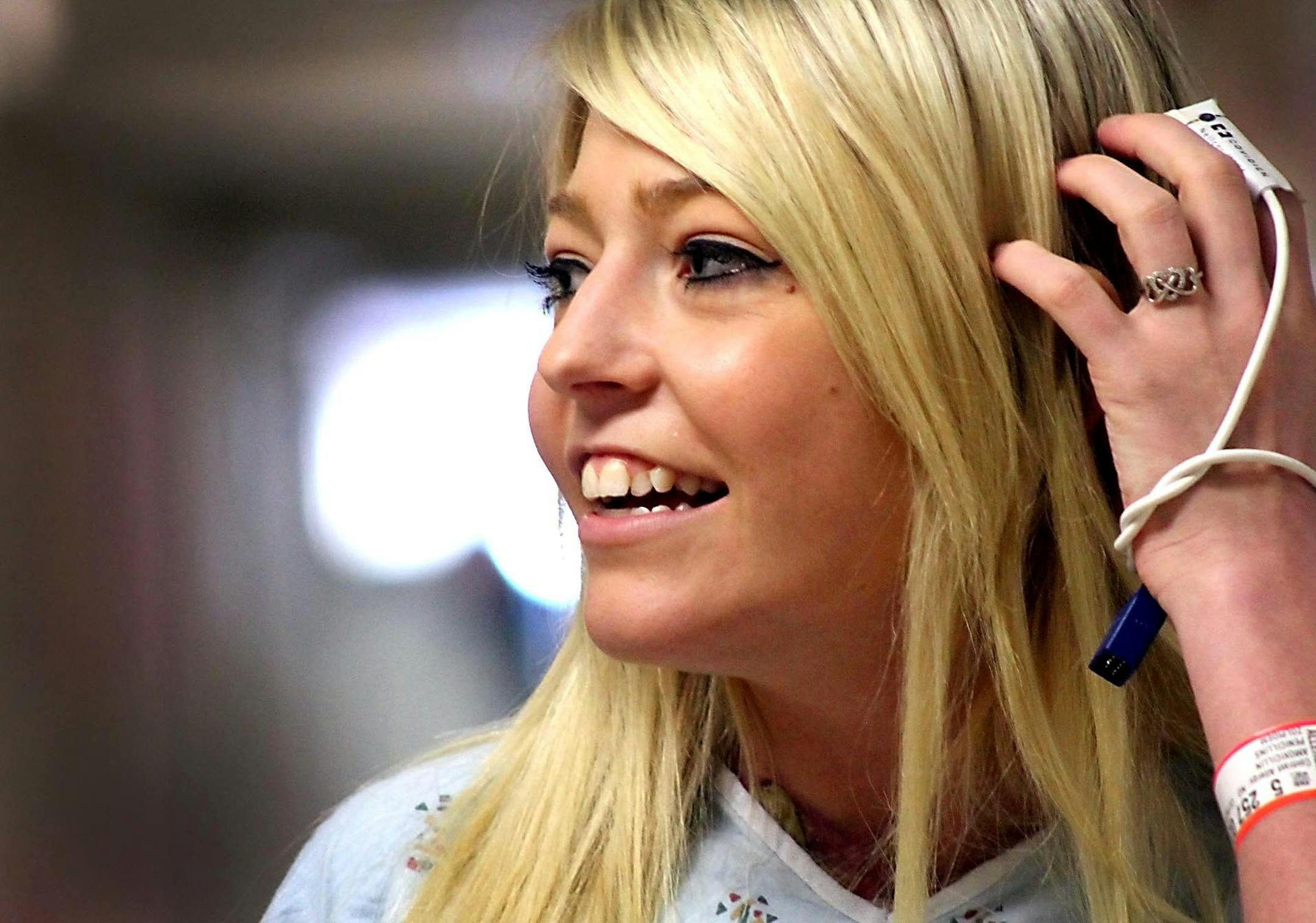 ADVANCE FOR MONDAY APRIL 1 - In this March 19, 2013 photo, Alyssa Sandeen, poses in a hospital room at St. Mary's Hospital in Rochester, Minn.. Fifteen years ago, Sandeen was in a Rochester hospital to get her first heart transplant. Now, sheís back and waiting for her second transplant. (AP Photo/Mankato Free Press, Robb Murray)