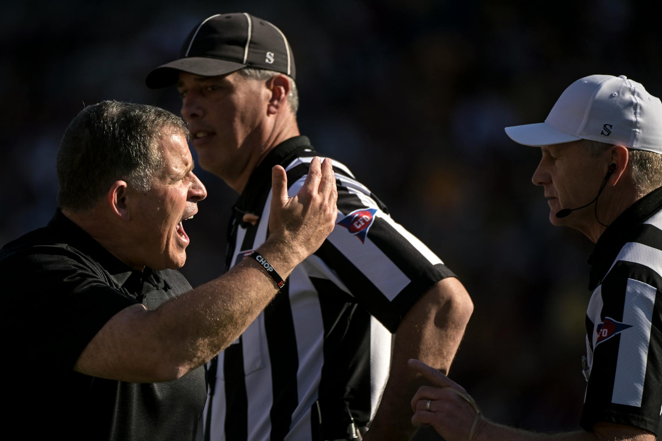 Rutgers Scarlet Knights head coach Greg Schiano argues with officials during the second half.