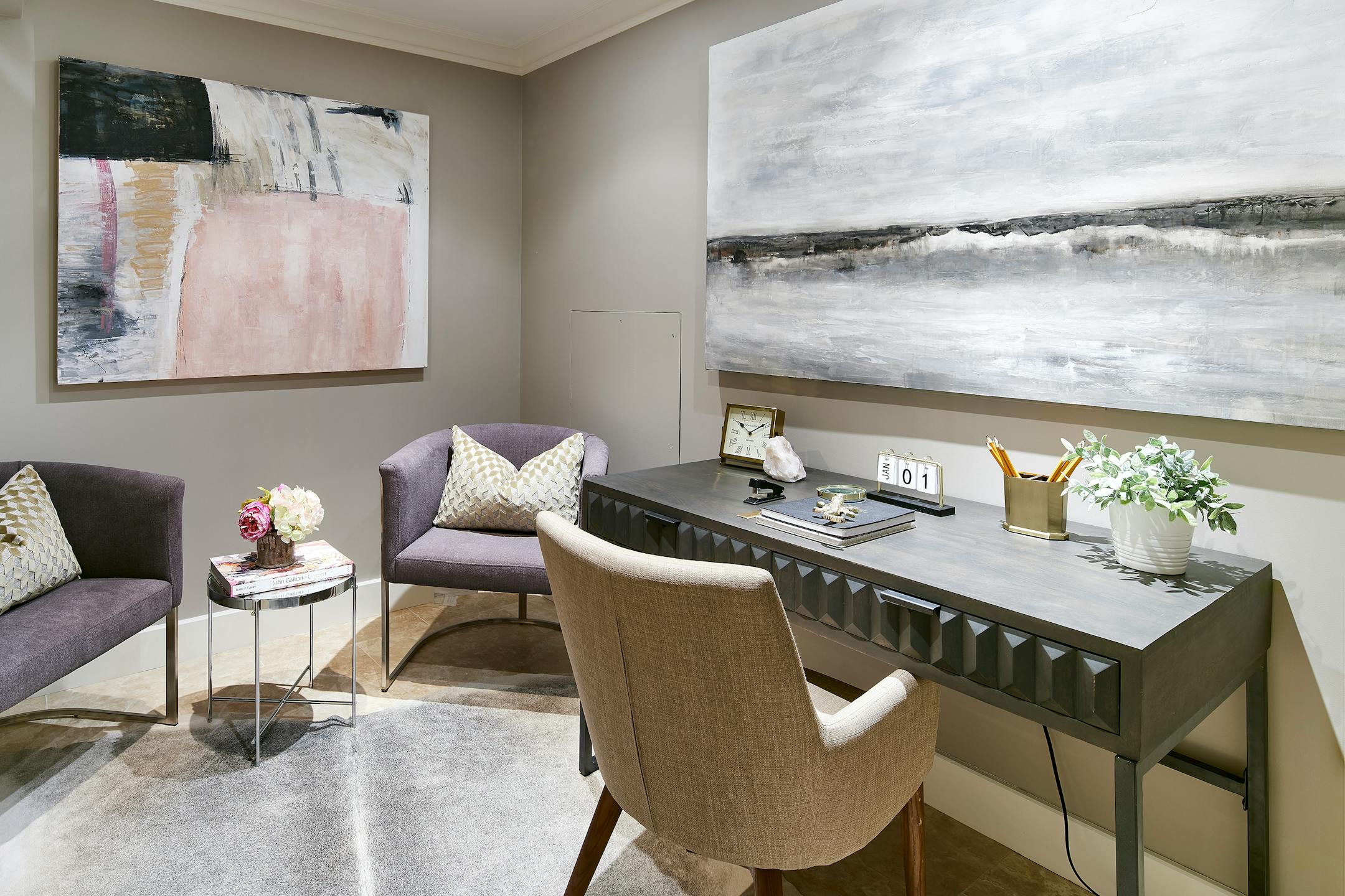 A windowless room is made brighter through the use of artwork and light fabrics. (Handout/TNS)