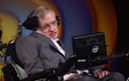 Stephen Hawking talks about his life and work during a public symposium to celebrate his 75th birthday at Lady Mitchell Hall in Cambridge. Cambridge, 