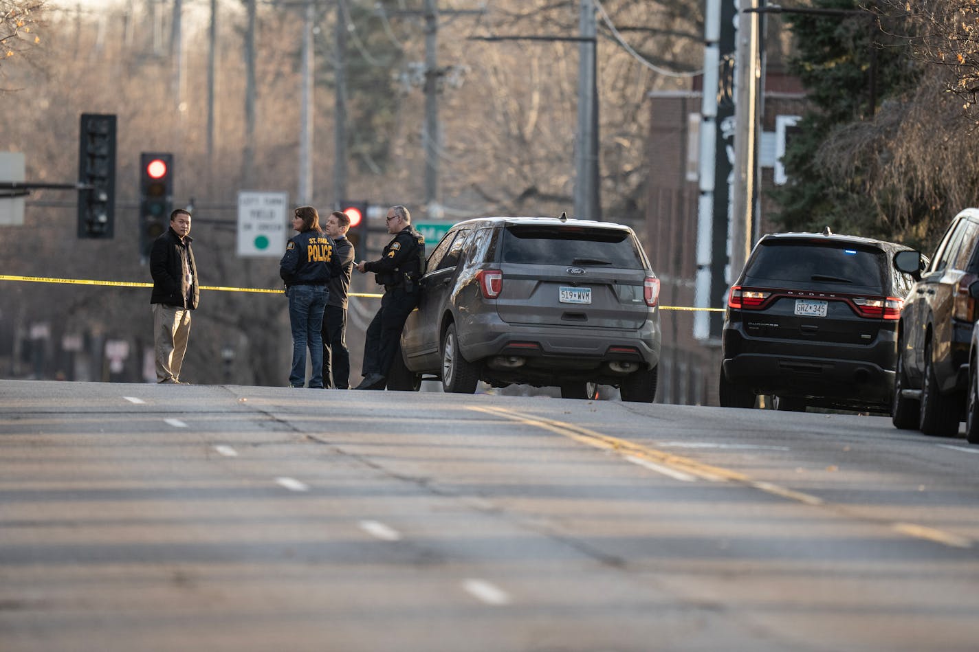 St. Paul police officers investigated the scene at Cretin and Marshall Avenues where it was reported that a St. Paul Police officer and a suspect were wounded after a shooting . The shooting happing near the intersection of Cretin and Marshall Avenues Thursday December 7 ,2023 in, St. Paul, Minn. ] JERRY HOLT • jerry.holt@startribune.com