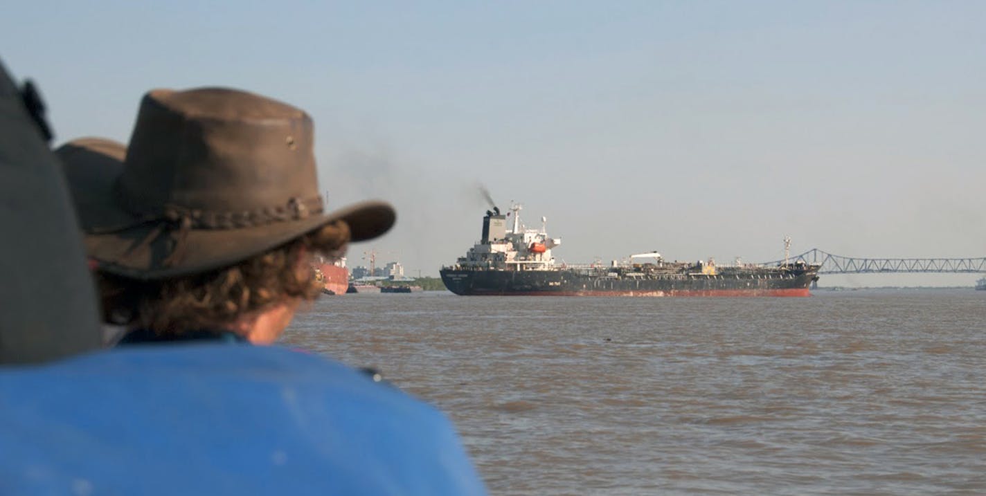 Especially near Baton Rouge, La., canoeists compete with commercial river traffic.