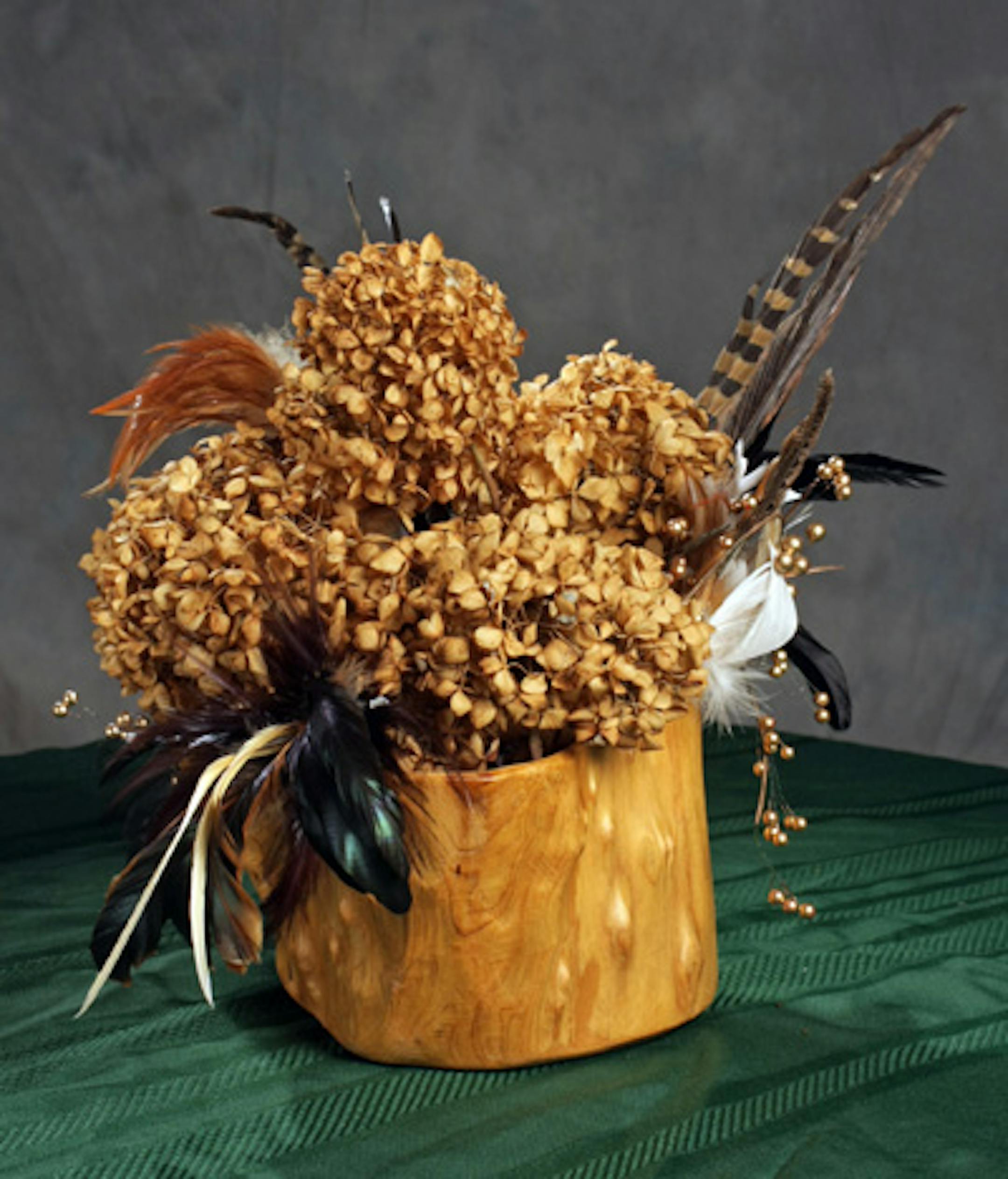 fall arrangement with feathers in wood base - for kim palmer blog