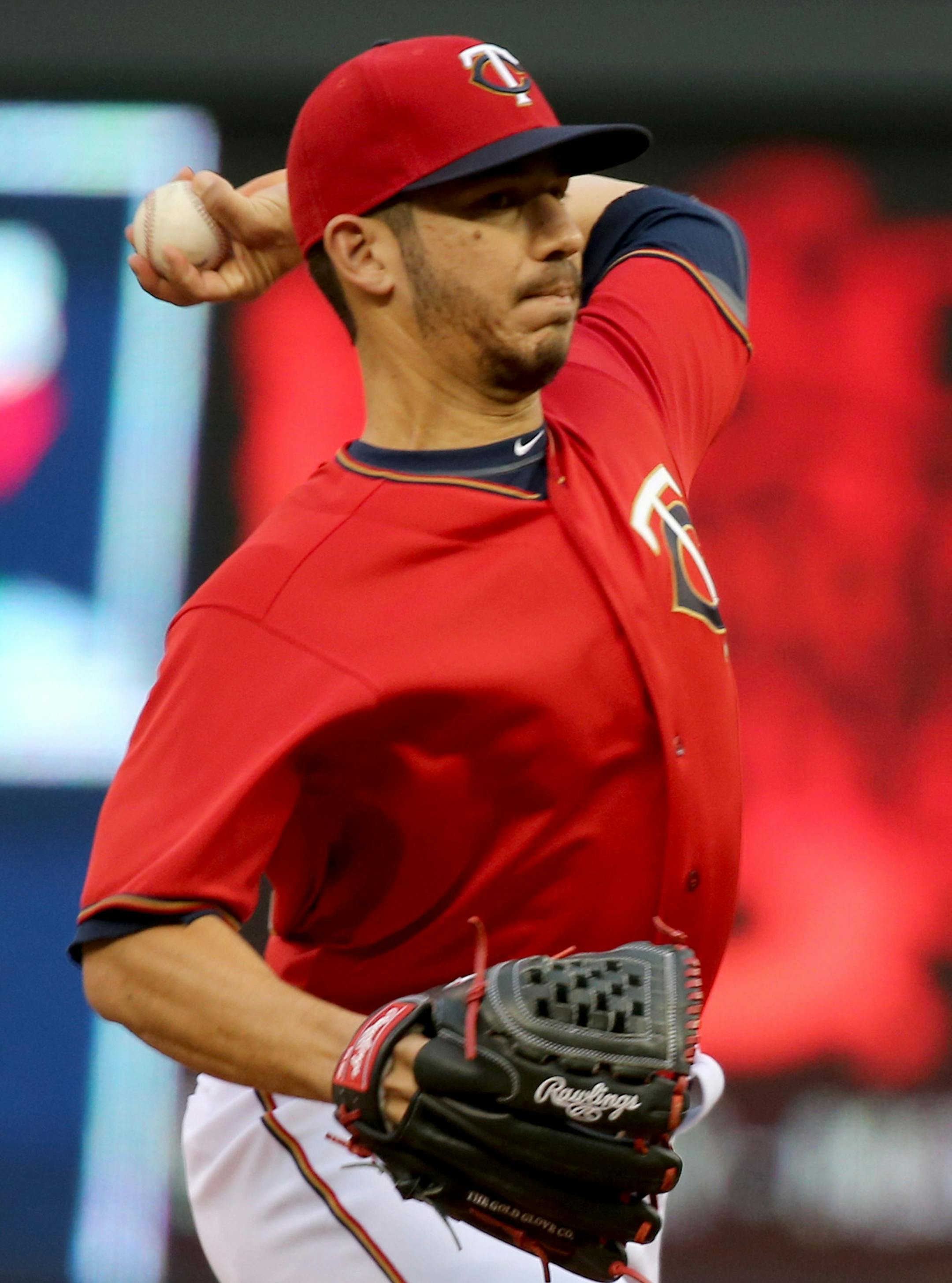 Minnesota Twins starter Tommy Milone delivers a pitch during the first inning of their game with the LA Angels Friday, April 15, 2016, at Target Field in Minneapolis, MN.](DAVID JOLES/STARTRIBUNE)djoles@startribune.com Minnesota Twins vs the LA Angels. It was Jackie Robinson at the ballpark for Major League teams across the country, with all players wearing number 42 in honor of Robinson.