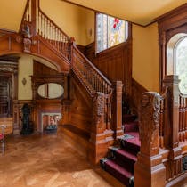 After a fire destroyed St. Cloud's Foley Mansion almost 20 years ago, the iconic 1889 residence has risen from the ashes with restored ornate woodwork