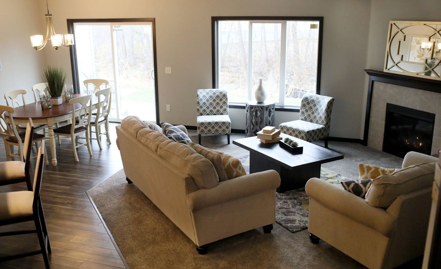 The open concept dining room and livingroom in a 2,100 square foot, three bedroom, three bath, side by side model townhome Wednesday, Nov. 28, 2018, in Mounds View, MN.] DAVID JOLES &#xef; david.joles@startribune.com Home building in the Twin Cities is in the midst of a seasonal slowdown, but sales of entry level new houses have been robust. Buildable lots that are affordable to entry level buyers, however, are in short supply.**Brooke Boss,cq