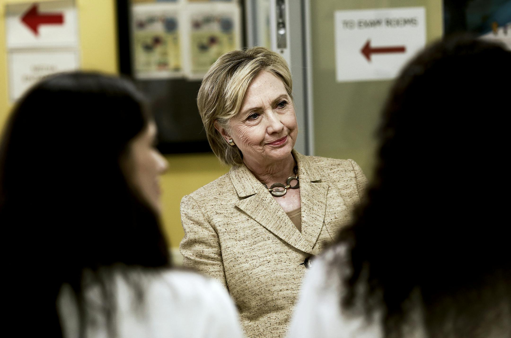 Hillary Clinton, the Democratic presidential nominee, greets members of the staff as she tours the Borinquen Health Care Center in Miami, Aug. 9, 2016. A new batch of State Department emails released Tuesday showed the close and sometimes overlapping interests between the Clinton Foundation and the State Department when Clinton served as secretary of state. (Scott McIntyre/The New York Times)