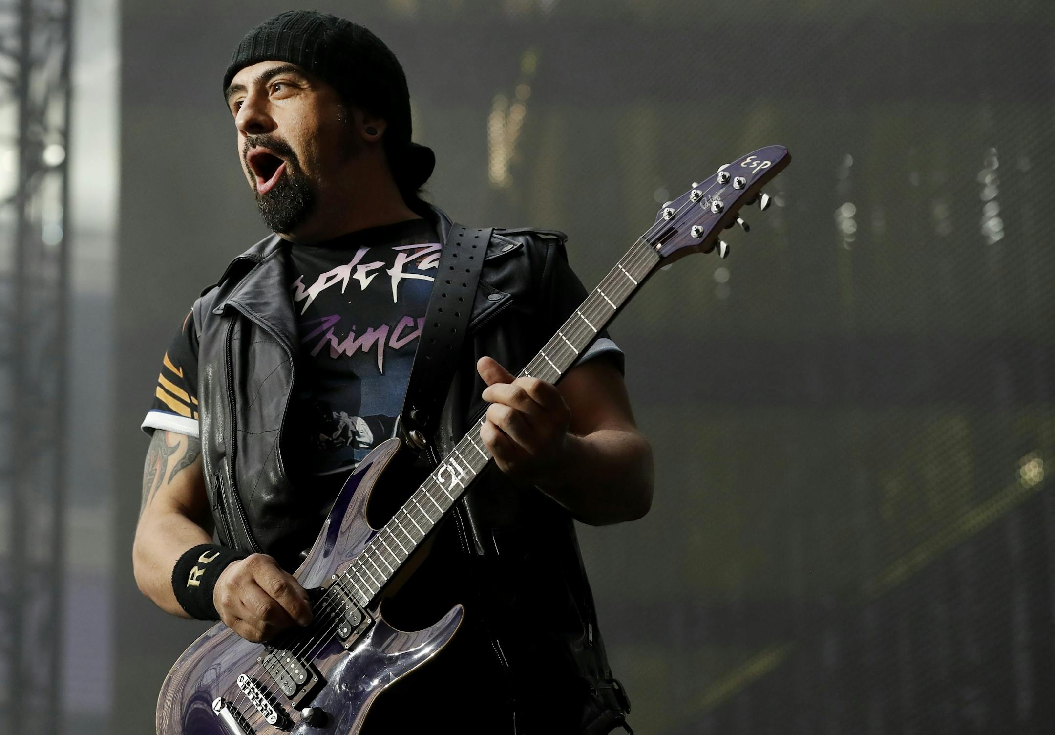Volbeat guitarist Roberto Caggiano wore a Prince Purple Rain shirt as the band performed at US Bank Stadium on Saturday