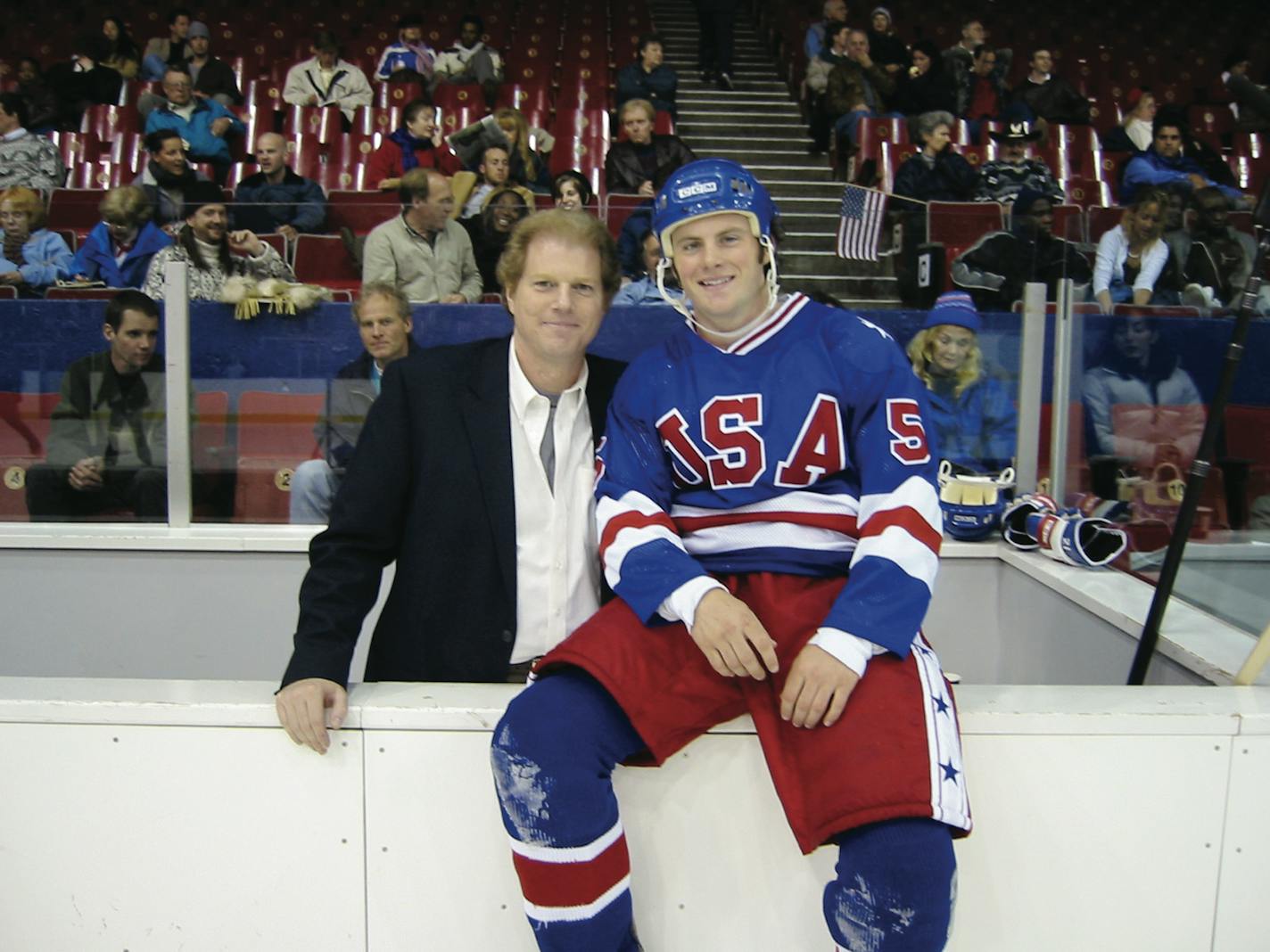 Joe Cure, right, paused during filming "Miracle" with actor Noah Emmerich, who portrayed Team USA assistant coach Craig Patrick.