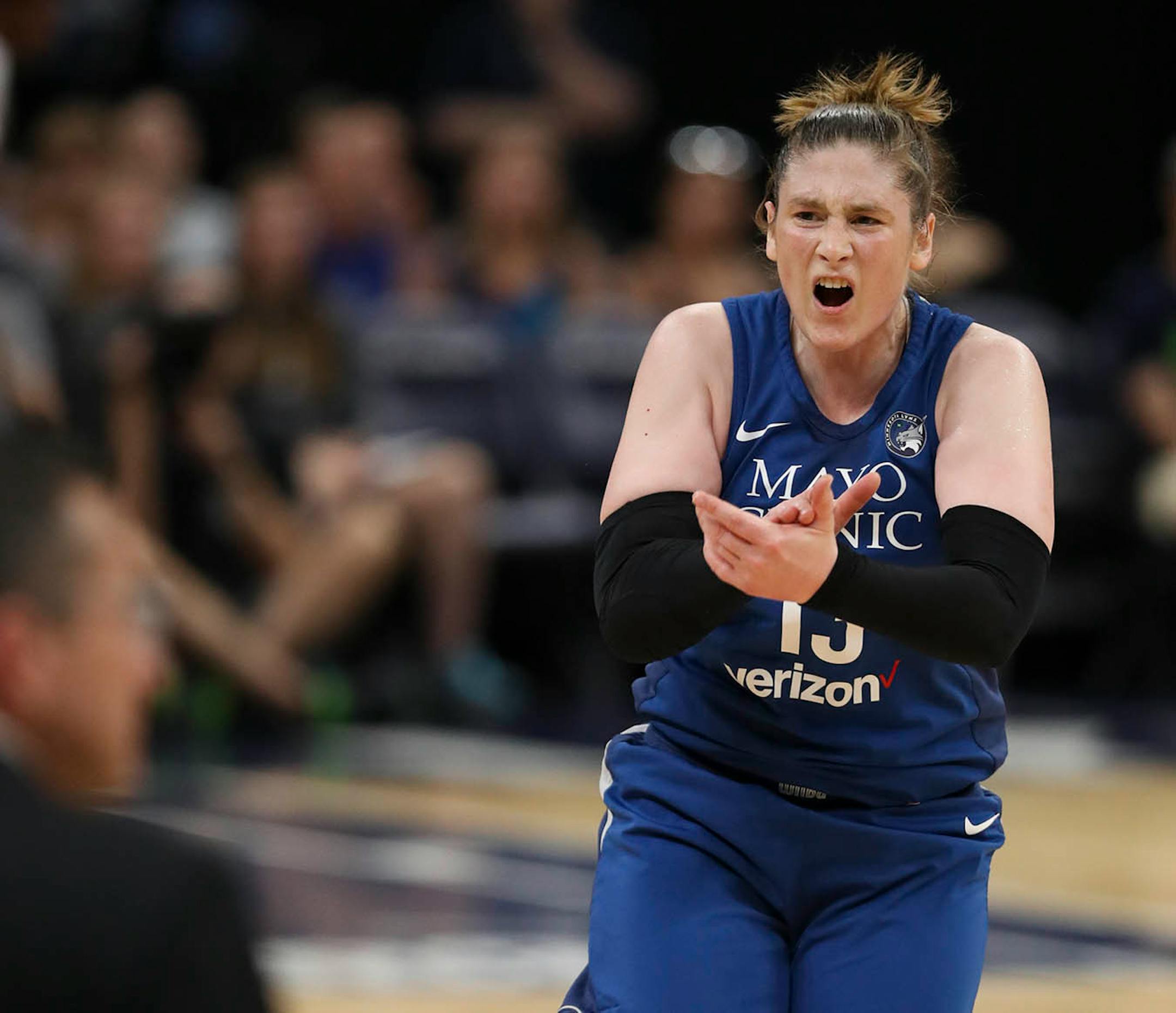 Minnesota Lynx guard Lindsay Whalen (13) reacted towards the Connecticut Sun bench after a missed three point shot attempt in the first quarter.