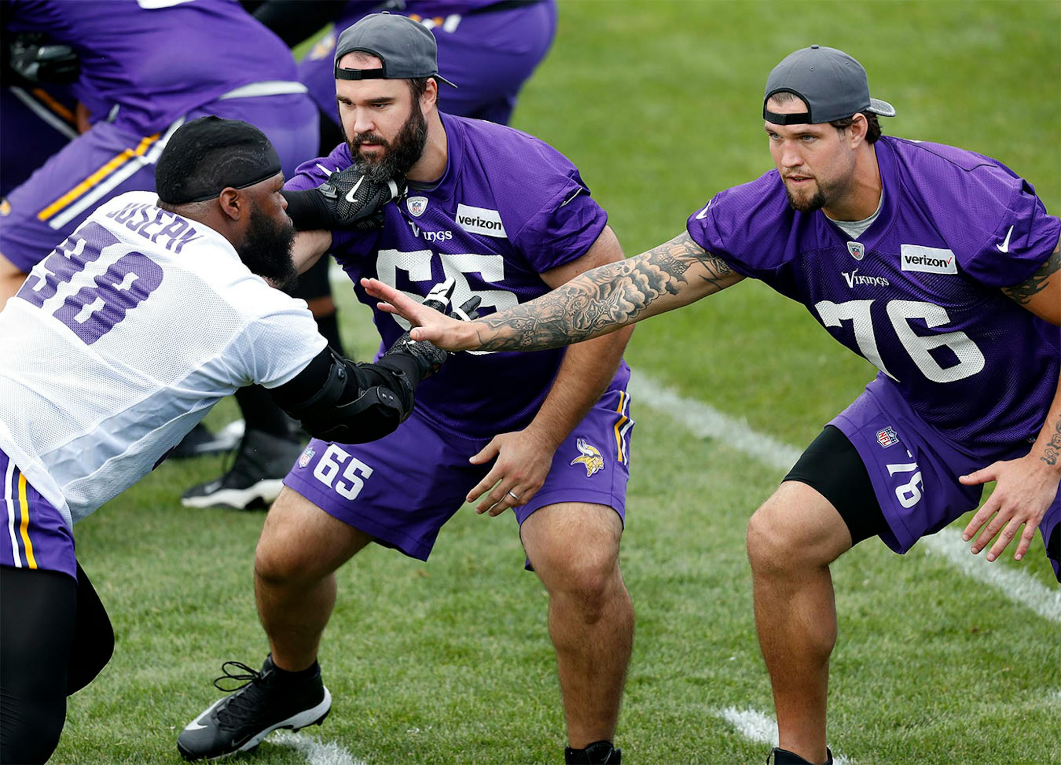 Linval Joseph (98) was blocked by John Sullivan (65) and Alex Boone (76) during the morning walk through. ] CARLOS GONZALEZ cgonzalez@startribune.com - July 29, 2016, Mankato, MN, Minnesota State University, Mankato, Minnesota Vikings Training Camp