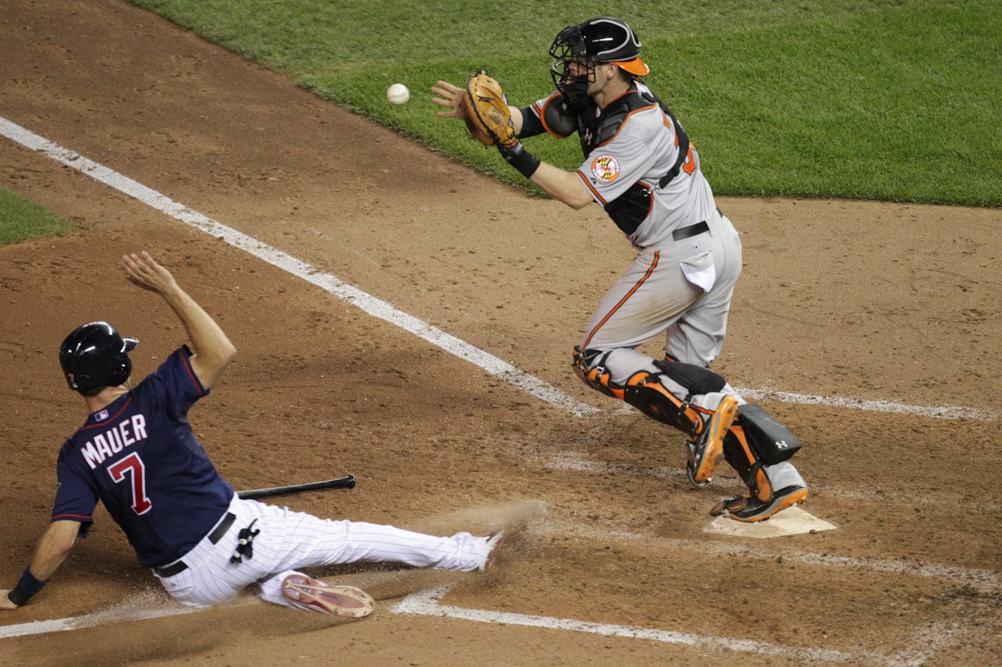 Twins Joe Mauer was forced out at the plate, as Orioles catcher Matt Wieters tagged the base in the fifth inning at Target Field TuesdayJuly 17, 2012 In Minneapolis ,MN .