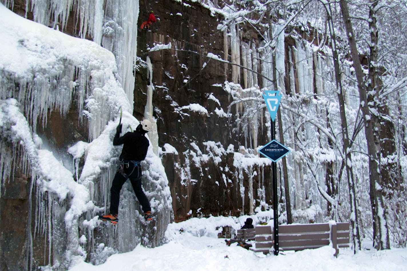 Peter Lenz hits the checkpoint at Sandstone Ice Park at Robinson Park, near Sandstone, Minn.