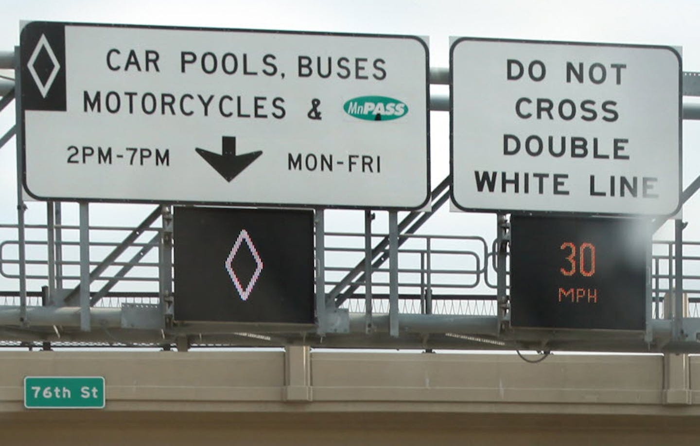 The signs for MnPass lanes on Interstate 35W in Bloomington.