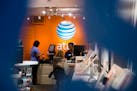 AT&T’s network in Minnesota and nearby states now uses GPS to pinpoint the location of callers to  emergency services. File photo of an AT&T store.
