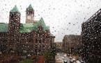 Minneapolis City Hall and the privately owned InterPark ramp as seen through rain drops clinging to a skywalk in April 2016.