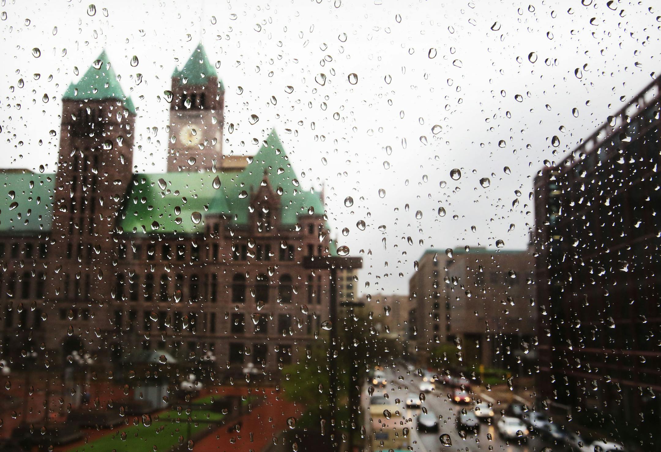 Minneapolis City Hall and the privately owned InterPark ramp as seen through rain drops clinging to a skywalk in April 2016.
