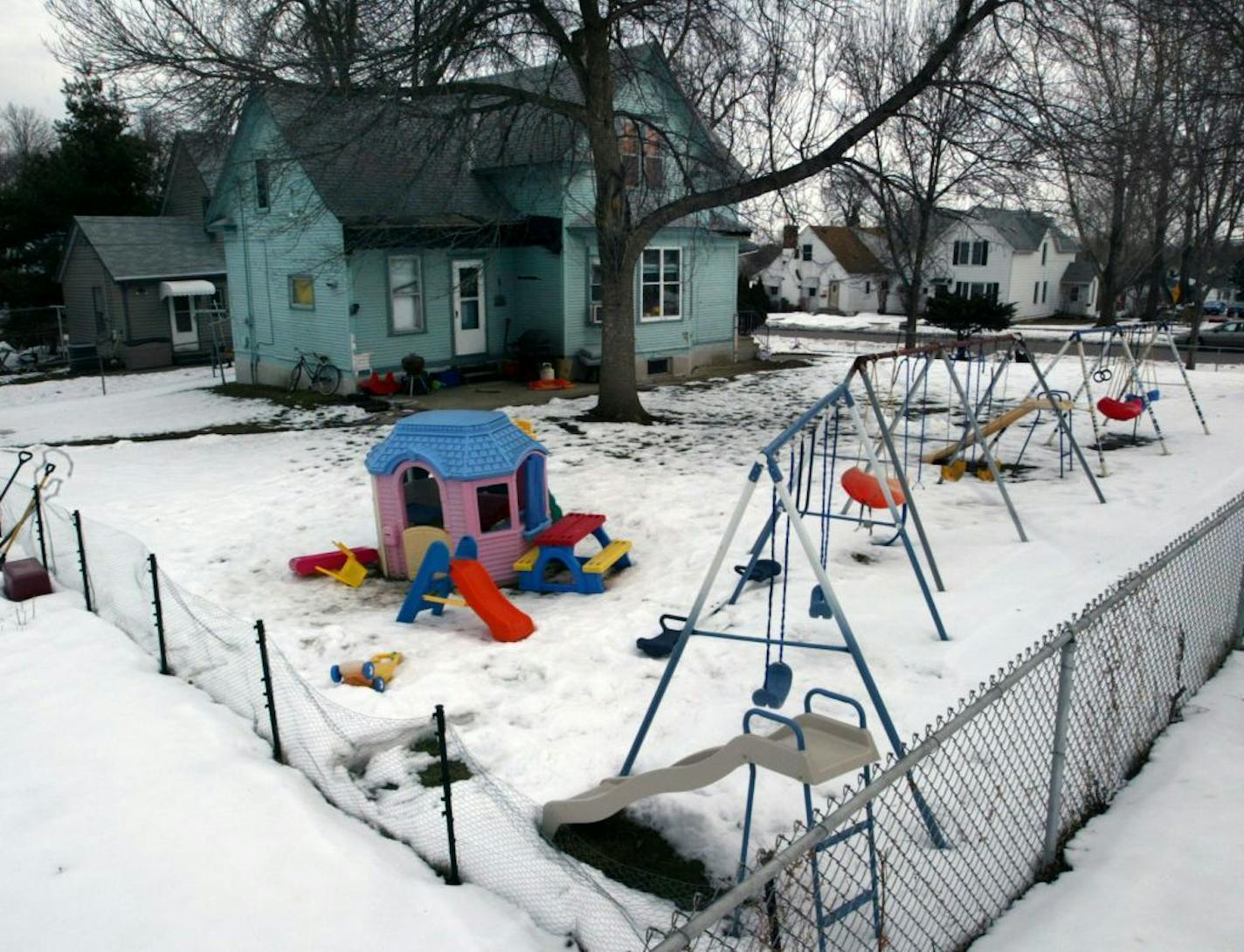 House on Gorman St. in West St. Paul that is the location of a daycare center where abuse of children allegedly took place. Authorities are interviewing 30 families whose children attended the day care run by a woman whose husband, Michael J. Schmit, 54, has been charged with sexually assaulting a girl in the home seven years ago. The home was licensed in 1993 for up to 14 children. GENERAL INFORMATION: 3/10/04- House on Gorman St. in West St. Paul that is the location of a daycare center wherea