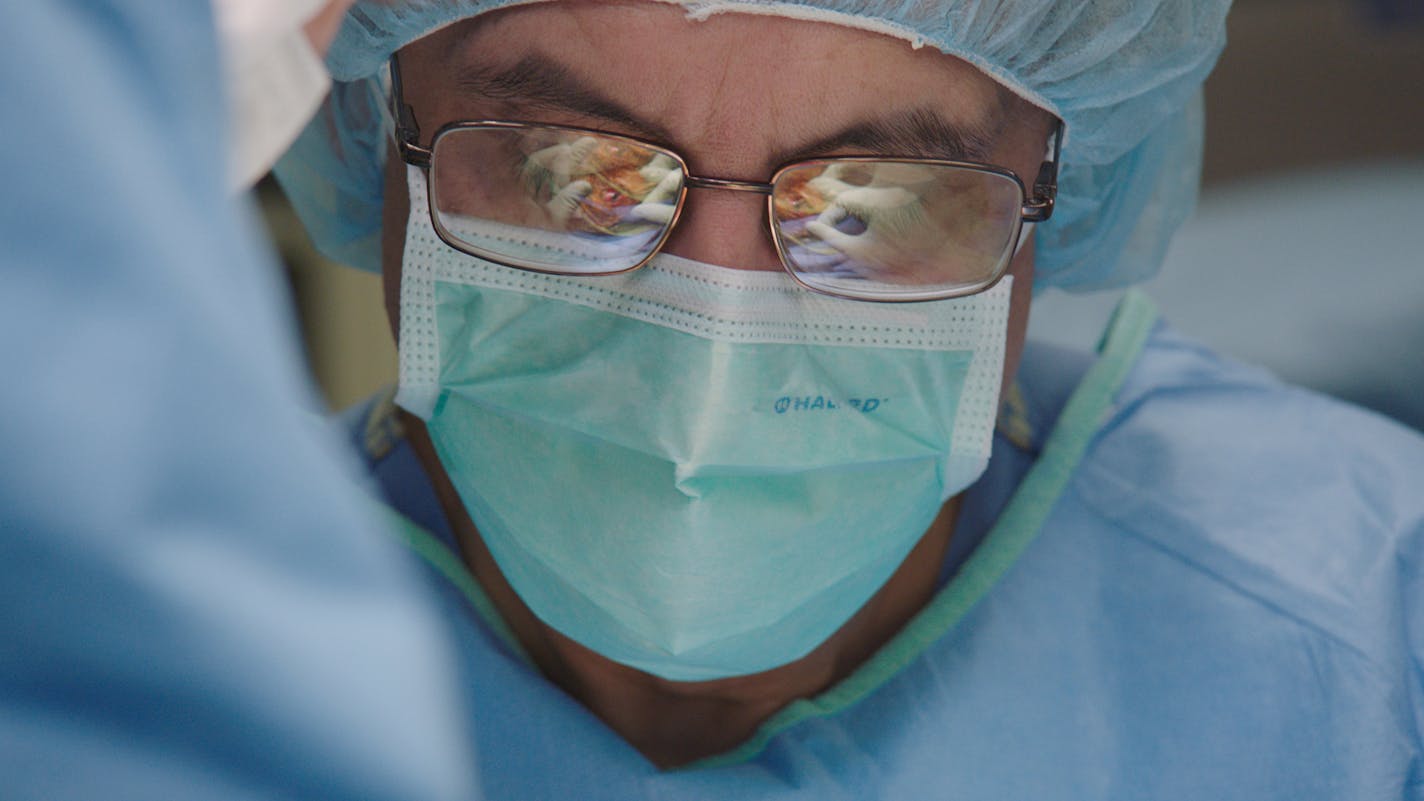 Dr. Jose Pulido performs eye surgery, as seen in the Ken Burns documentary "The Mayo Clinic: Faith-Hope-Science."