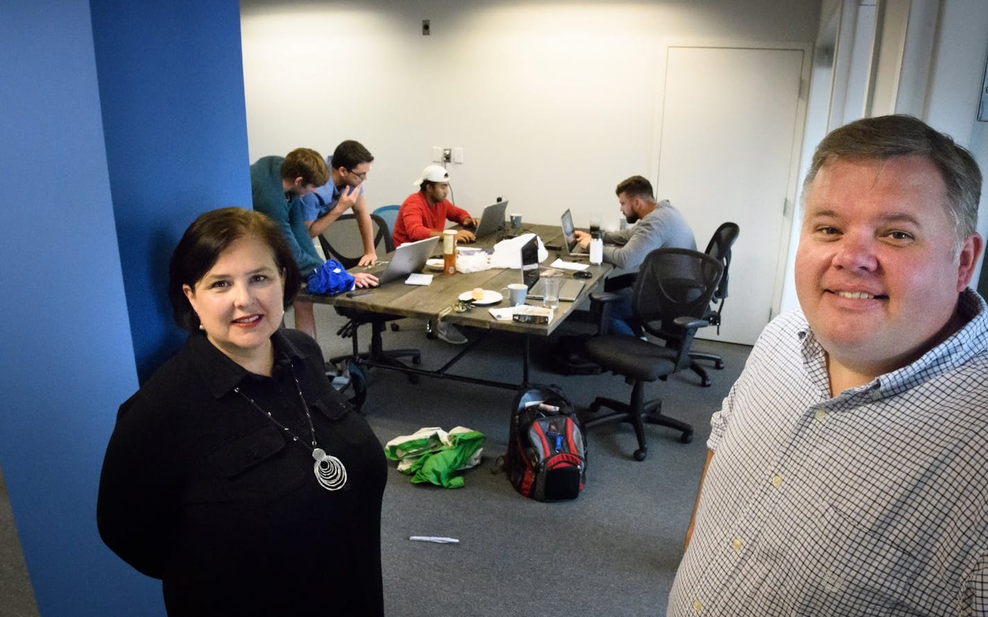 Mobile Composer founders Catherine Gillis and Loren Horsager with interns, from left, David Munkvold, Carlos Lopez, Kameren Lymon and Kyle Blackburn.