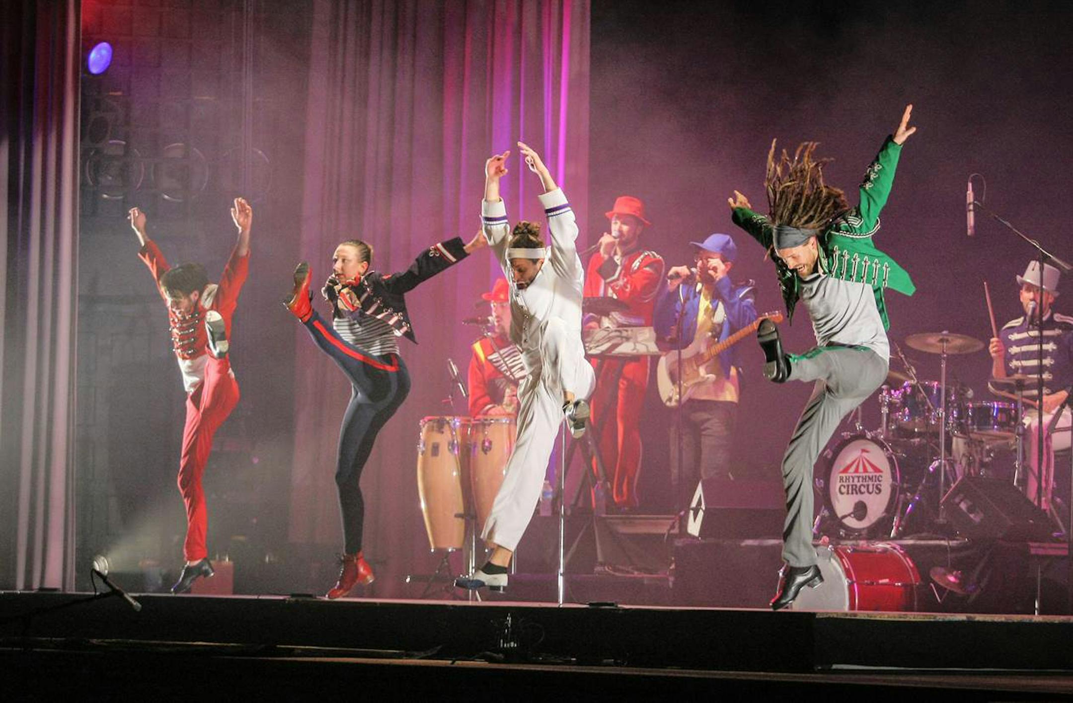Rhythmic Circus includes dancers, from left, Galen Higgins, Kaleena Miller, Ricci Milan and Nick Bowman. In the background, the musicians are, from left, Aaron Heaton, Cornell Blanchard, Alex Rossi and Patrick Nelson.