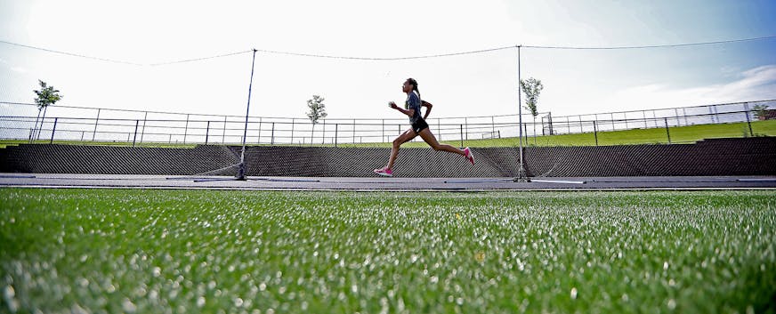Chanhassen sprinter Jedah Caldwell made her way around the track during a morning workout, Thursday, June 9, 2016 at Chanhassen High School in Chanhassen, MN. ] (ELIZABETH FLORES/STAR TRIBUNE) ELIZABETH FLORES � eflores@startribune.com