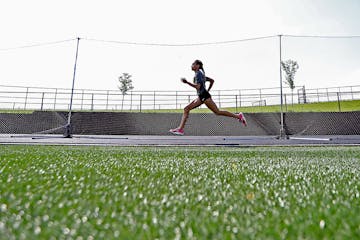 Chanhassen sprinter Jedah Caldwell made her way around the track during a morning workout, Thursday, June 9, 2016 at Chanhassen High School in Chanhas