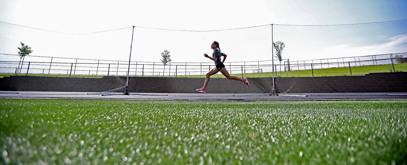 Chanhassen sprinter Jedah Caldwell made her way around the track during a morning workout, Thursday, June 9, 2016 at Chanhassen High School in Chanhassen, MN. ] (ELIZABETH FLORES/STAR TRIBUNE) ELIZABETH FLORES � eflores@startribune.com