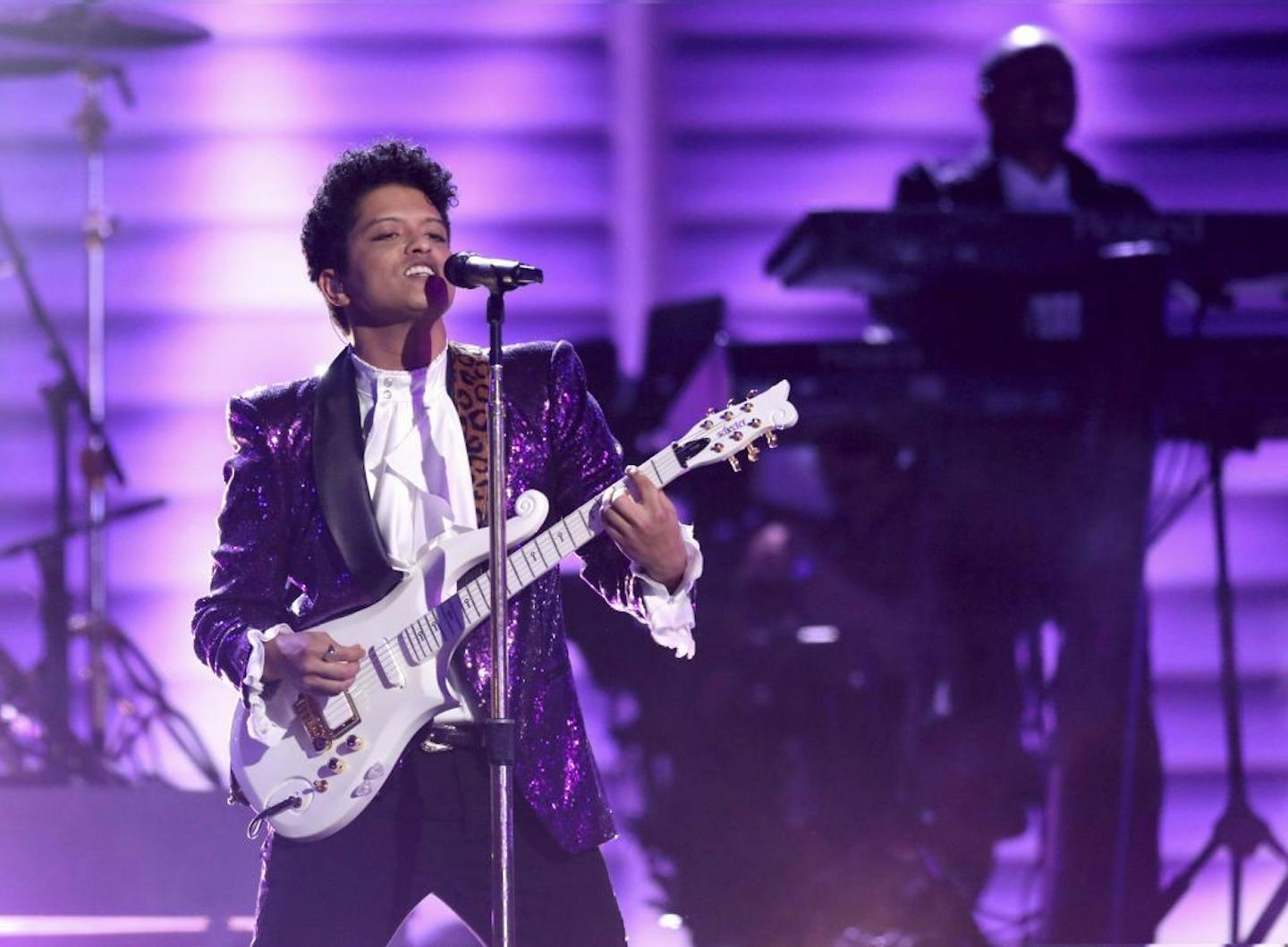 Bruno Mars performs a tribute to Prince at the 59th annual Grammy Awards.