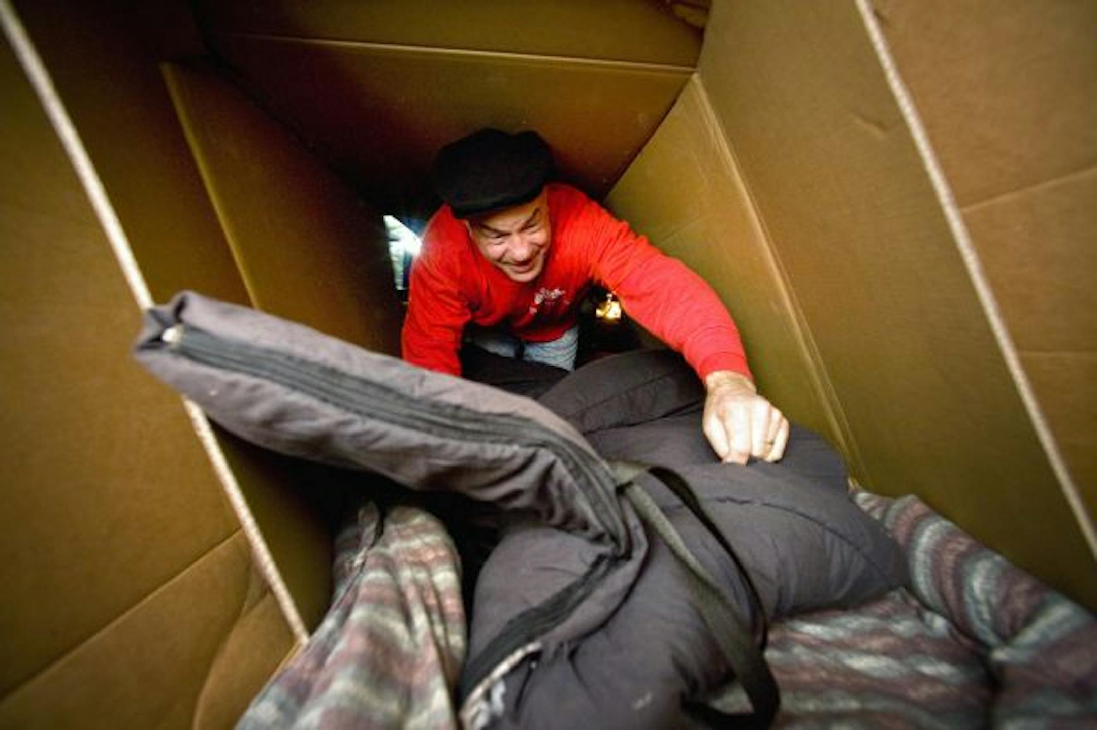 Lakeville Keller Wiliams agent Steve Rall spent the night sleeping on this box during the company national service day to raise awareness about homelessness.