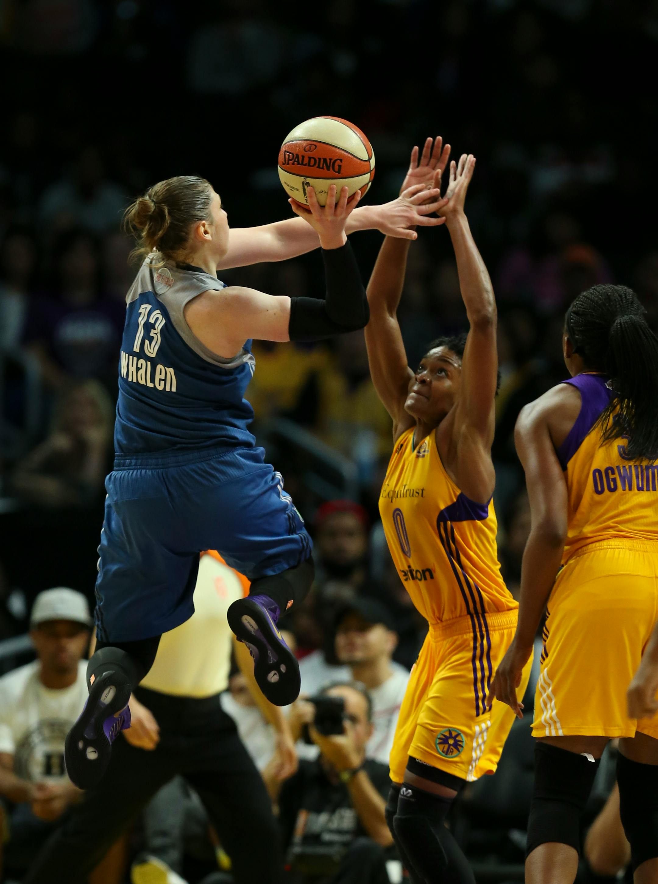 Minnesota Lynx guard Lindsay Whalen (13) put up a fourth quarter shot over Los Angeles Sparks guard Alana Beard (0). She finished with 13 points for the night.