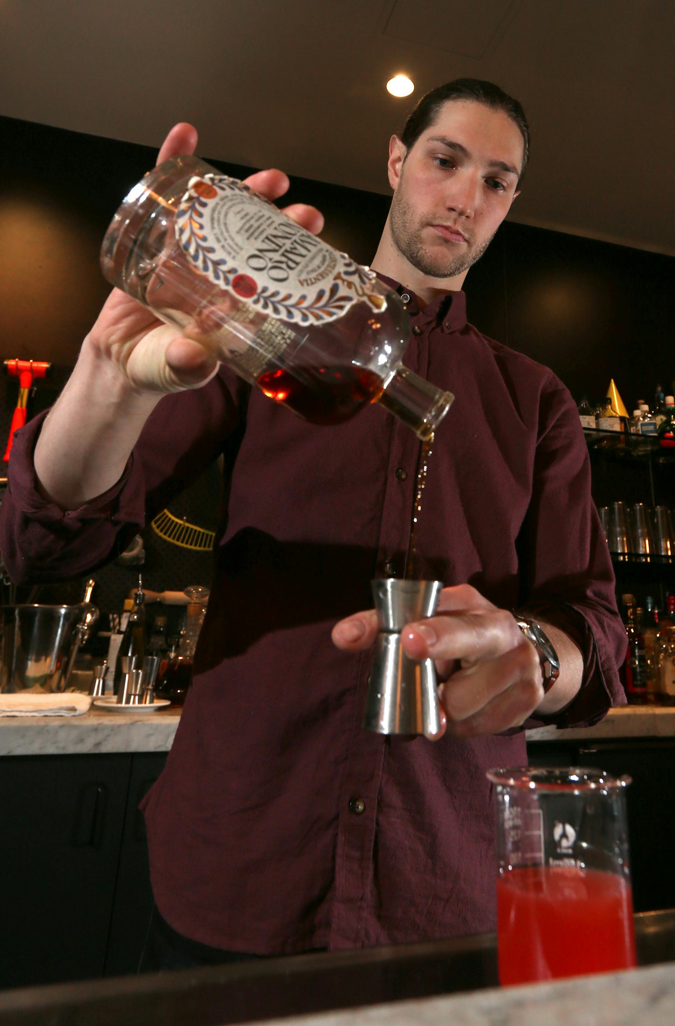 Bartender Matthew Voss, photographed at the Marvel Bar on 2/14/14. Mad about amaro": Basically a sweeping introduction to the amaro category of liqueurs. This family of bittersweet Italian liqueurs shows up on cocktail menus across town, but they're largely foreign to the average guest. With help from local bartenders, the story would look at the variety of flavors found within the category -- from the lighter/sweeter Amaro Nonino to the potent cult favorite Fernet Branca, aka the "bartenders ha