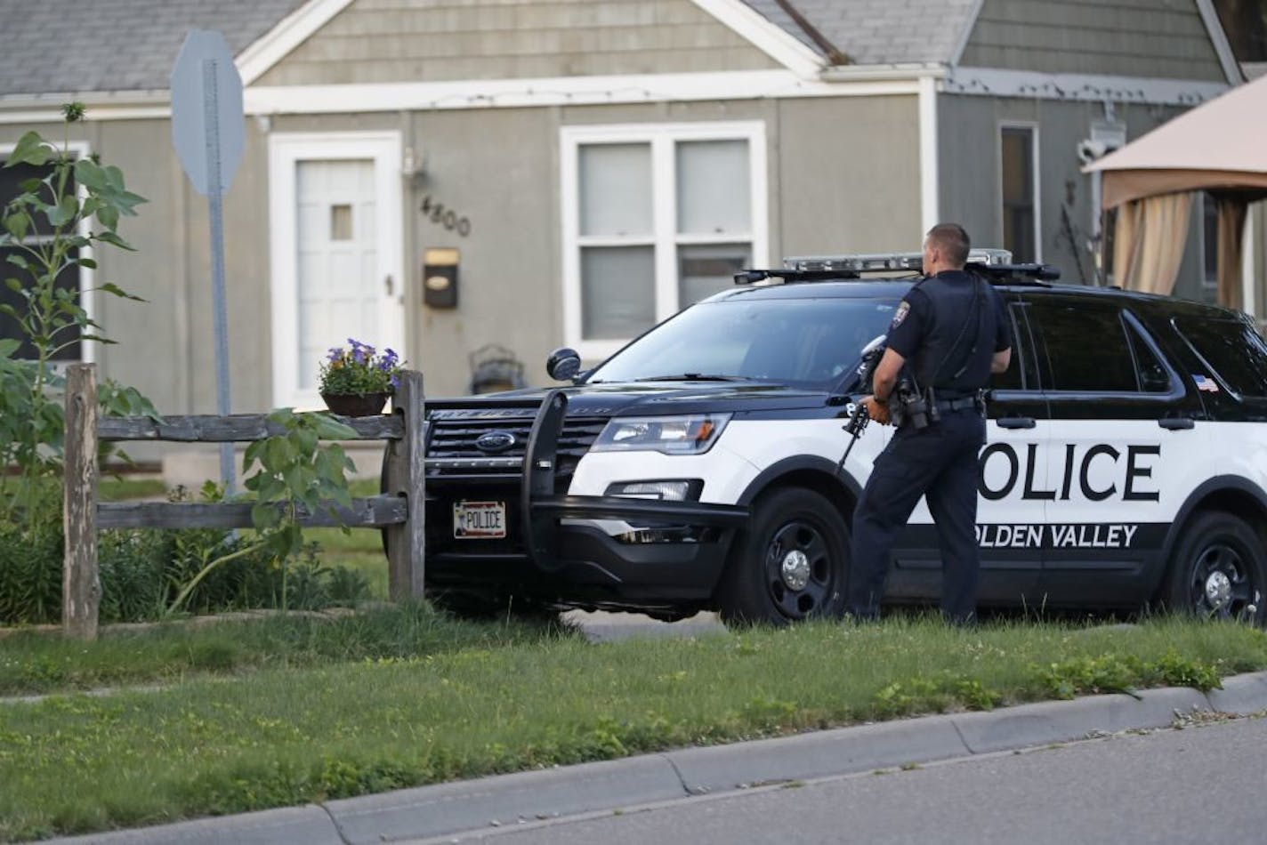 Police officers swarmed the area around the 4800 block of Yates Avenue N. in Crystal on Wednesday night in response to an apparent standoff that followed a shooting in a home there.