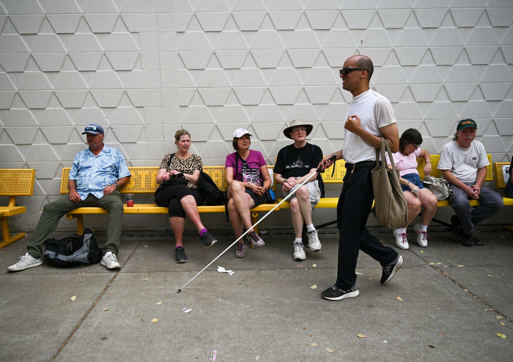 Paivy Ballayan, of Roseville, makes his way toward the Creative Activities Annex.